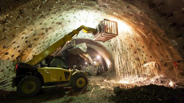 Cherry picker lift machine working in underground tunnel